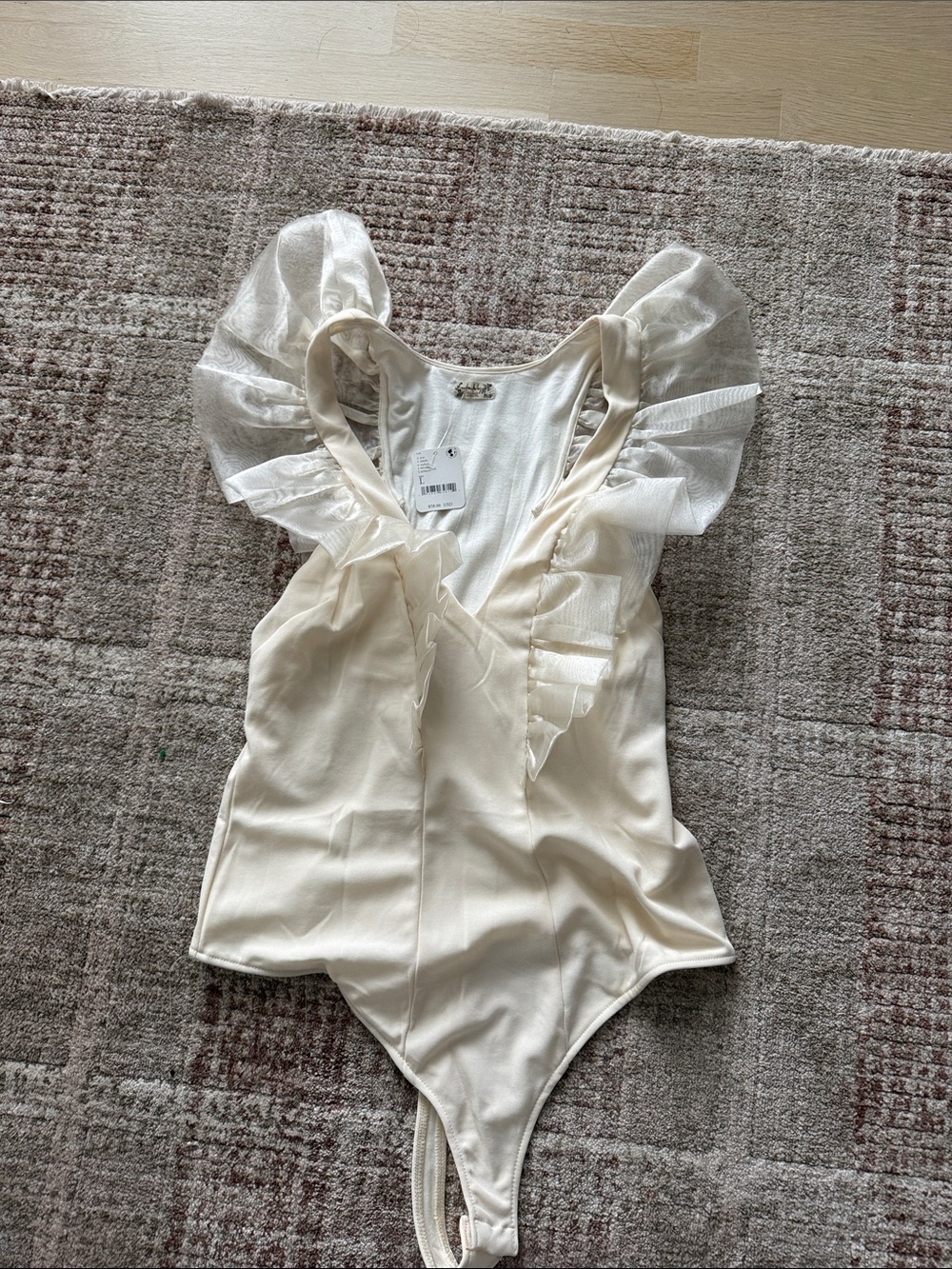 Free People Cream Ruffle-Shoulder One-Piece Bodysuit